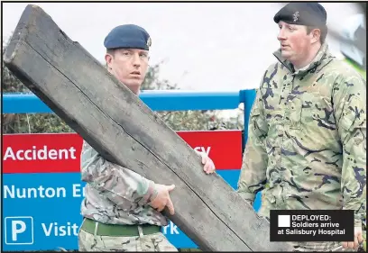  ??  ?? DEPLOYED: Soldiers arrive at Salisbury Hospital