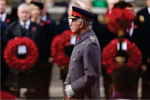  ?? (Reuters) ?? The King pays his respects at the Cenotaph in Whiteha ll yesterday
