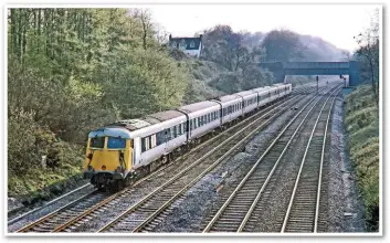  ?? RAIL PHOTOPRINT­S/JOHN VAUGHAN. ?? In April 1973, shortly before withdrawal, a seven-car rake enters Sonning Cutting east of Reading with the Down afternoon Bristol Pullman.