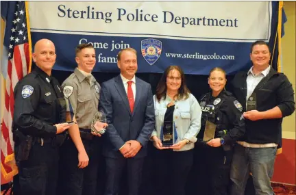  ?? JEFF RICE — JOURNAL-ADVOCATE ?? From left, Det. Mike Zordani, Explorer Jasper Boyce, Chief Kerr, Danyel Cullip, Cpl. Danyelle Hass and and Sgt. James Rank.