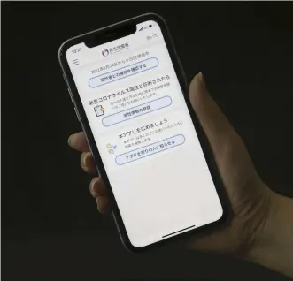  ?? Yomiuri Shimbun file photo ?? The COVID-19 Contact-Confirming Applicatio­n, COCOA, is shown on a smartphone.