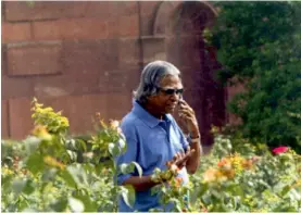  ??  ?? A.P.J. Abdul Kalam during one of his morning walks in Rashtrapat­i Bhavan; Kalam in a jovial mood with children.