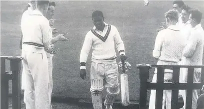  ?? Bacup Cricket Club ?? ●● Sir Everton Weekes is clapped off the pitch after another big innings for Bacup