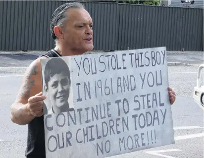  ?? PHOTO: JARED MORGAN ?? Taking a stand . . . Alexandra man Toni Jarvis holds a placard outside the town’s Oranga Tamariki office last year, describing his plight at the hands of child welfare agencies in 1961. He believes little has changed since.
