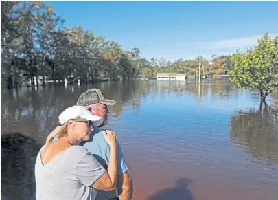  ?? DAvID goLDMAN/Ap ?? En Linden, Carolina del Norte, desazón por la inundación que causó Florence