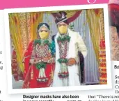  ?? PHOTO: PTI ?? Designer masks have also been in vogue recently ride and groom wear masks during their wedding