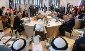  ?? (AP/Jacquelyn Martin) ?? The opening roundtable begins at the Negev Summit, as Israel’s Foreign Minister Yair Lapid (clockwise from left) makes opening remarks with U.S. Secretary of State Antony Blinken, United Arab Emirates’ Foreign Minister Sheikh Abdullah bin Zayed Al Nahyan, Morocco’s Foreign Minister Nasser Bourita, Egypt’s Foreign Minister Sameh Shoukry, and Bahrain’s Foreign Minister Abdullatif bin Rashid al-Zayani Monday in Sde Boker, Israel.