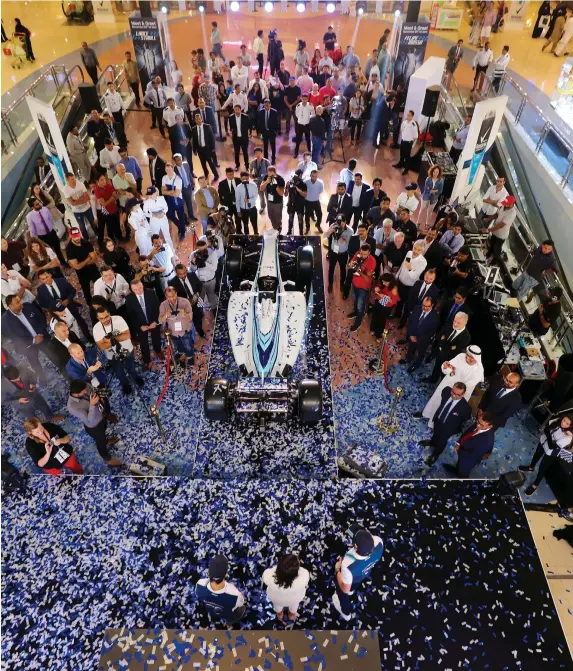  ?? Chris Whiteoak / The National ?? Williams Formula One team drivers Felipe Massa and Lance Stroll took some time out to answer fans’ questions at Mushrif Mall in Abu Dhabi