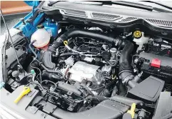  ??  ?? The Titanium trim is powered by a 1.0-L EcoBoost turbocharg­ed three-cylinder engine.