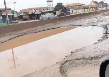  ??  ?? Another bad portion of Sango-Ota-Idiroko Road