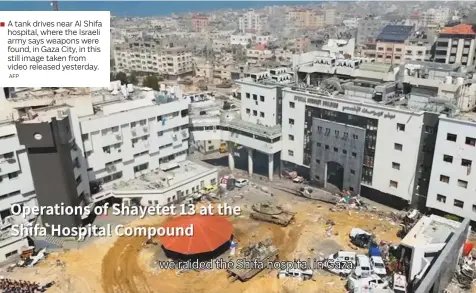  ?? AFP ?? A tank drives near Al Shifa hospital, where the Israeli army says weapons were found, in Gaza City, in this still image taken from video released yesterday.