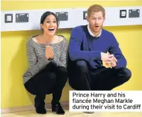  ??  ?? Prince Harry and his fiancée Meghan Markle during their visit to Cardiff