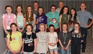  ??  ?? The under 12A girls soccer team with managers Rob McNamara, Pat O’Hara and Jim Morrissey at Charlevill­e AFC’s awards night at the Charlevill­e Park Hotel.