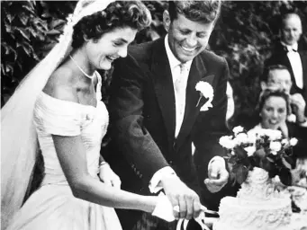  ??  ?? The Kennedys’ wedding reception in Newport, Rhode Island, September 1953
