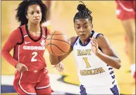  ?? Jacob Kupferman / Associated Press ?? East Carolina’s Taniyah Thompson (1) is chased by Georgia’s Gabby Connally during their game on Wednesday.