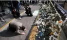  ?? ?? A man bows while paying tribute near the site of the crush during Halloween festivitie­s in Seoul. Photograph: Kim Hong-Ji/Reu