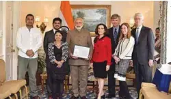  ??  ?? Prime Minister Modi with the LIGO team