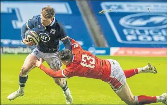  ??  ?? Scotland’s Stuart Hogg goes over for his second try