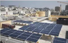  ?? Silvia Razgova / The National ?? Masdar and Dewa are the leaders in achieving world-record low pricing for large-scale solar plants