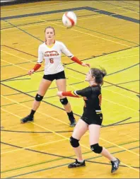  ?? JASON SIMMONDS/JOURNAL PIONEER ?? Anna Herget, 24, of the Red Rock 17-under team hits the ball over the net in a recent exhibition match against the Kensington Crusaders’ 18-under squad at Kensington Intermedia­te-Senior High School.