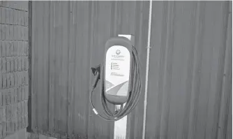  ?? NICHOLAS MERCER • SALTWIRE NETWORK ?? This electric vehicle charging station located in front of the Bay Arena in Bay Roberts is believed to be the first such station in Conception Bay North.