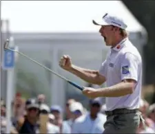  ?? THE ASSOCIATED PRESS ?? Brandt Snedeker reacts after making a birdie putt on the ninth hole during the first round of the Wyndham Championsh­ip on Thursday in Greensboro, N.C.