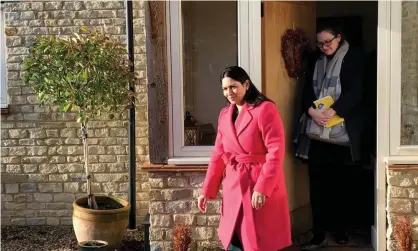  ??  ?? Priti Patel leaves after a meeting with the family of Harry Dunn in north Oxfordshir­e on Sunday. Photograph: Joe Gammie/PA