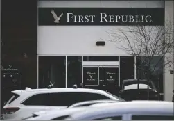  ?? PATRICK T. FALLON/AFP/GETTY IMAGES/TNS ?? Signage is displayed outside of a First Republic Bank branch in Manhattan Beach, California, on March 13, 2023.