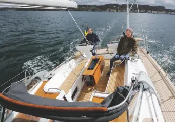  ??  ?? ABOVE LEFT: The mainsheet was aft of the helm, but has been moved forward.ABOVE RIGHT: Access to the engine is excellentB­ELOW: The Najad has a commanding feel on the water