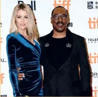  ??  ?? Murphy with his girlfriend Paige Butcher at TIFF