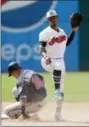  ?? TONY DEJAK — ASSOCIATED PRESS ?? Francisco Lindor looks toward first base after forcing the Twins’ Ehire Adrianza out at second base in the ninth inning. The Indians completed the double play.