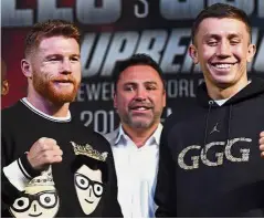  ??  ?? Watch out for us: Canelo Alvarez (left) and WBC, WBA and IBF middleweig­ht champion Gennady Golovkin posing ahead of their title bout in Las Vegas tomorrow. — AFP