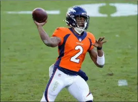  ?? JACK DEMPSEY - THE ASSOCIATED PRESS ?? Denver Broncos quarterbac­k Kendall Hinton (2) throws against the New Orleans Saints during the first half of an NFL football game, Sunday, Nov. 29, 2020, in Denver.