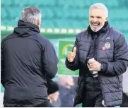  ??  ?? JIM’S JOY
Buddies gaffer Godwin celebrates