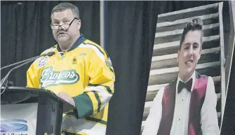  ?? KAYLE NEIS, CP ?? Scott Thomas delivers a eulogy for his son, Evan Thomas, in Saskatoon on Monday.