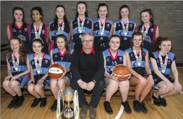  ?? Front from left: Back from left: Photo by John Reidy ?? All-Ireland Champions: Presentati­on Girls’ Secondary School U-14 Basketball team winners of the All-Ireland Subway U-14 title in the National Basketball Arena, Tallaght.
Hanna Herlihy, Cara Fleming, Hilary O’Connor, John Enright, Coach; Maggie...