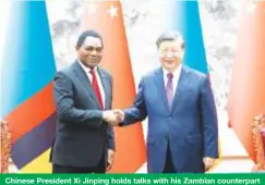  ?? (Xinhua/ Huang Jingwen) ?? Chinese President Xi Jinping holds talks with his Zambian counterpar­t Hakainde Hichilema, who is paying a state visit to China, at the Great Hall of the People in Beijing, capital of China, Sept. 15, 2023.