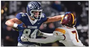  ?? (Special to the NWA Democrat-Gazette/Brian Sanderford) ?? Greenwood wide receiver Luke Brewer (left) holds off Lake Hamilton’s Caleb Waller during Friday night’s 6A-West Conference game at Smith-Robinson Stadium in Greenwood. More photos are available at arkansason­line.com/116lhgw/