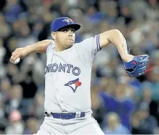  ?? LINDSEY WASSON/ GETTY IMAGES ?? Toronto Blue Jays closer Roberto Osuna ptiches in a game against the Seattle Mariners on June 10.