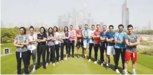  ??  ?? Players pose for a picture at the Emirates Golf Club in Dubai on Monday.