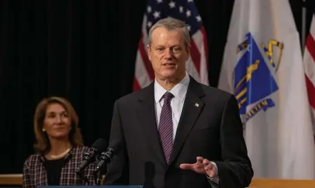  ?? Pool pHoToS ?? BACK IN BUSINESS: Gov. Charlie Baker speaks at a socially distanced news conference Wednesday at the State House. The state is poised for another round of reopening businesses as coronaviru­s conditions improve.