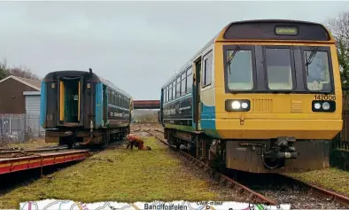  ?? DAVID MEE ?? Above: ‘Pacer’ No. 142006 being unloaded at its new home at Cynheidre on February 15.