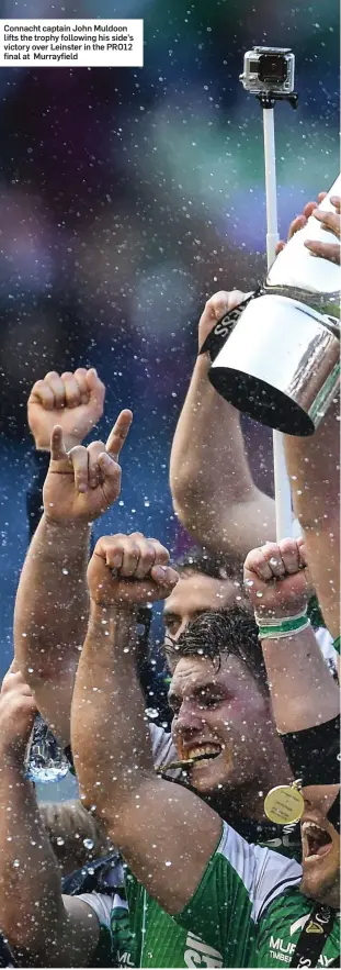  ??  ?? Connacht captain John Muldoon lifts the trophy following his side’s victory over Leinster in the PRO12 final at Murrayfiel­d