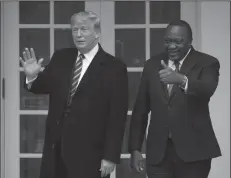  ?? YURI GRIPAS/ABACA PRESS ?? U.S. President Donald Trump and Kenyan President Uhuru Kenyatta face reporters Thursday before their meeting in the Oval Office of the White House in Washington, D.C.