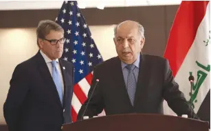  ?? (Hadi Mizban/Reuters) ?? IRAQI OIL MINISTER Thamer Ghadhban (right) speaks during a press conference in Baghdad yesterday, as US Energy Secretary Rick Perry looks on.