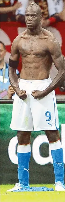  ??  ?? Italy’s Mario Balotelli celebrates after scoring the 2-0 lead during the semifinal match of the UEFA Euro 2012 between Germany and Italy in Warsaw, Poland.