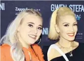  ??  ?? Brigitte Kruse poses for a photo with singer Gwen Stefani.