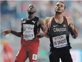  ?? PETR DAVID JOSEK THE ASSOCIATED PRESS ?? Andre De Grasse ended Canada’s 28-year world championsh­ips medal drought in the men’s 200 metres in Doha, Qatar, on Tuesday.