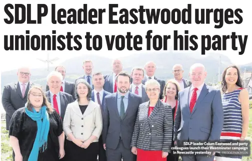  ?? FREDDIE PARKINSON ?? SDLP leader Colum Eastwood and party colleagues launch their Westminste­r campaignin Newcastle yesterday