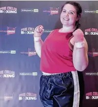  ??  ?? Liz Ridley, from Hallidays, took part in pink collar boxing to raise money for Beechwood